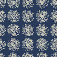 Seamless pattern with white spirals. Blue background.