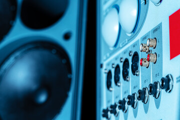 Rear panel of music system amplifier with wires