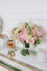 Gift bouquet for the holiday for the girl on a white wall