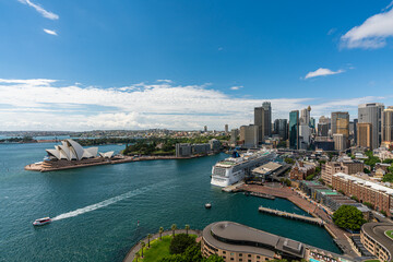 Fototapeta premium Panorama view of Sydney harbor bay and Sydney downtown skyline with opera house in a beautiful afternoon, Sydney, Australia.