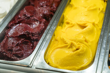 Colorful fruit italian sorbet  gelato ice cream in the gelato shop in Italy