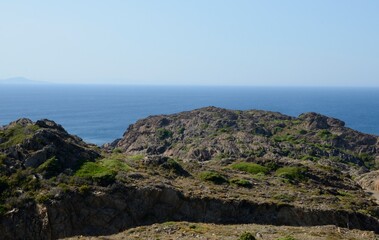 Fototapeta na wymiar Rocky field at sea border in Costa Brava, Spain