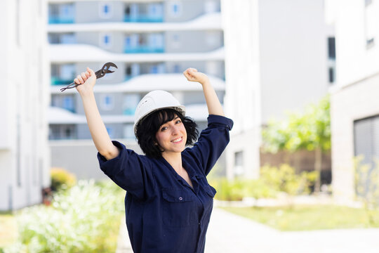 Young Woman With Blue Collar And Helmet Outside