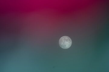 Full moon with red and blue background