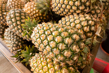 pineapple fruit at traditional marketplace