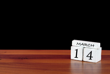 14 March calendar month. 14 days of the month. Reflected calendar on wooden floor with black background