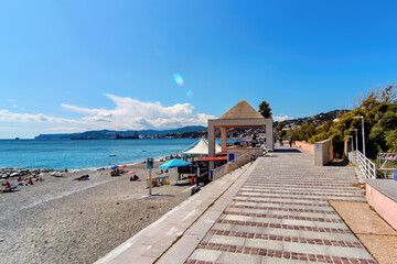 Beach and embankment street in Savona, Italy