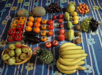 fruits and vegetables in floral background