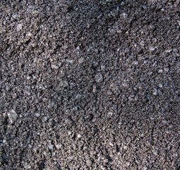 Texture of fresh raw asphalt closeup