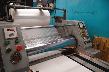 Industrial laminator, lamination of paper products. The manufacture of packaging. Outdated...