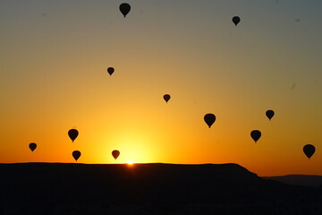 hot air balloons at sunrise