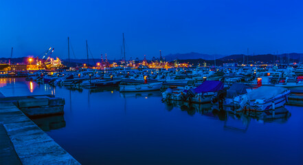 Fototapeta na wymiar A view across the marina at night in La Spezia, Italy in summer