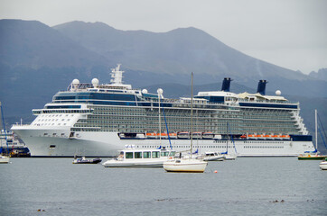 Celebrity cruiseship or cruise ship liner Eclipse with sailing boats and vessels in port of...