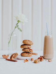 Obraz na płótnie Canvas Healthy Homemade oatmeal cookies with walnuts. Healthy vegan food concept.