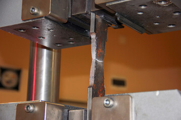 Tensile test with welded steel piece for procedure qualification record ( PQR ).