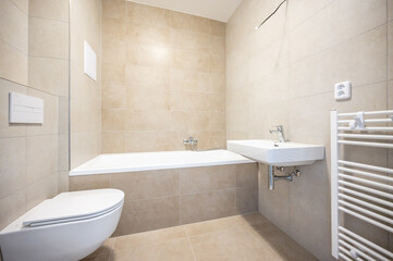Fototapeta na wymiar Bathroom and toilet in an apartment for rent. Real estate photo.