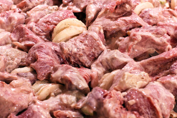 Pickled kebab. Fresh meat with onions. Food background