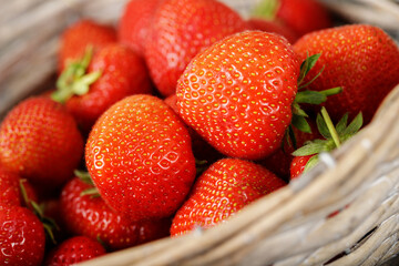 Fresh strawberries in a basket closeup