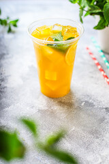 orange juice drink or lemonade mint transparent beverage glass cup takeaway drink Menu concept serving size food background top view copy space for text organic healthy eating