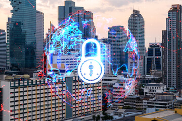Hologram of Padlock on sunset panoramic cityscape of Bangkok, Asia. The concept of cyber security...