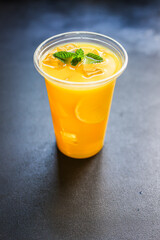 orange juice drink or lemonade mint transparent beverage glass cup takeaway drink Menu concept serving size food background top view copy space for text organic healthy eating