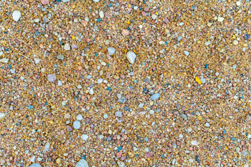 Sand and pebbles of various sizes and colors
