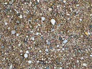 Texture of sand with pebbles
