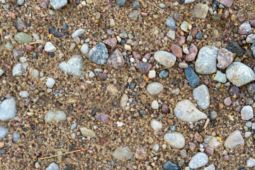 Sand and pebbles of various sizes and colors