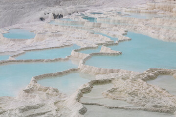 Natural travertine pools and terraces in Pamukkale, Denizli, Turkey.