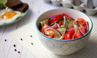 tomatoes and cucumbers salad with red onion