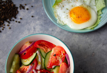 tomatoes and cucumbers salad with red onion