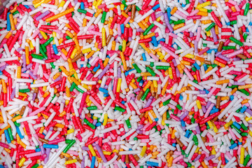 Fototapeta na wymiar Colorful sprinkles for ice cream
