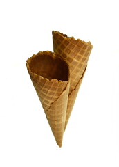 Empty waffle Cup for ice cream isolated on white background. Waffle cone on white background. Empty sugar waffle cones. 