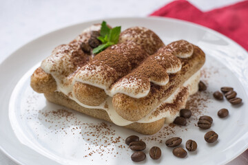 Sweet  Homemade Italian Tiramisu Dessert with Cocoa Powder.