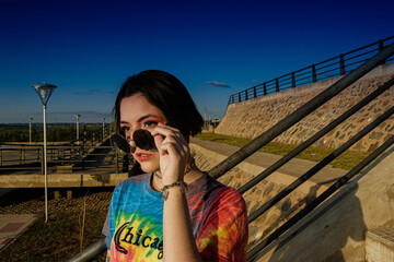 teenager with alternative look on sunny day