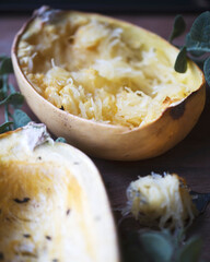 Baked spaghetti squash on wooden table