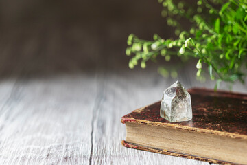 Old book and mineral stones crystals. Crystal Ritual, Healing Crystals. Natural gemstones....