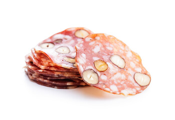 Sliced italian salami with hazelnuts.