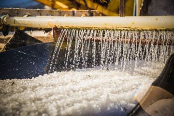 Macau, Rio Grande do Norte - June 08, 2016: Salt production in the interior of Brazil, machine...