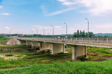 Fototapeta premium City, Krymsk, Russia, Krasnodar Territory, the bridge over the Adagum River 