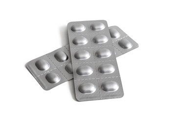 Two foil blister packs with tablets