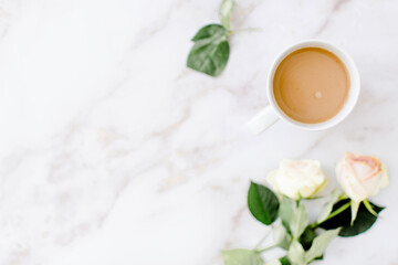 Coffee cup and. roses