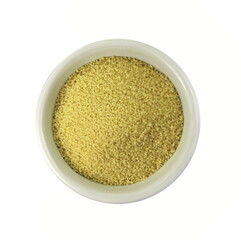 Dry couscous in white ceramic bowl isolated on white. 