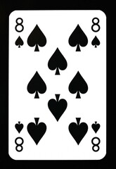 Eight of spades playing card isolated on black.