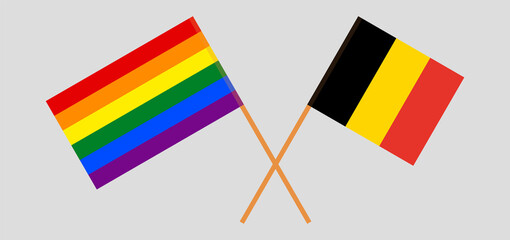 Crossed flags of LGBT and Belgium