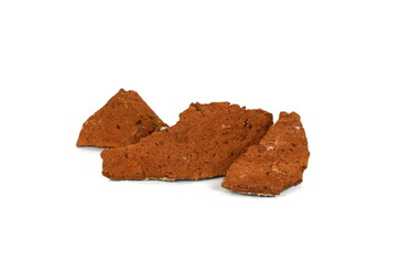 Shattered, broken bricks isolated on white background.