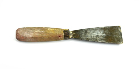 Old dirty and rusty putty knife isolated on white background with clipping path