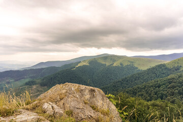 Stone Against Mountains and Skies