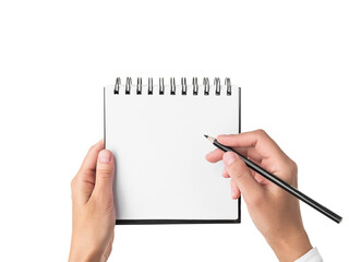 hands holding a square spiral notebook with blank white pages on white isolated background. woman is going to write notes in notebook with black pencil. mockup, space for text. education concept