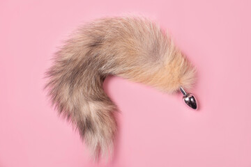 on a pink background sex product, toy for adults